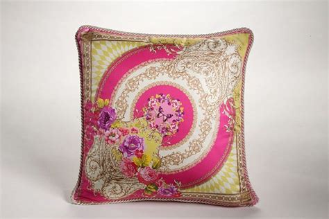 pink versace cushions.